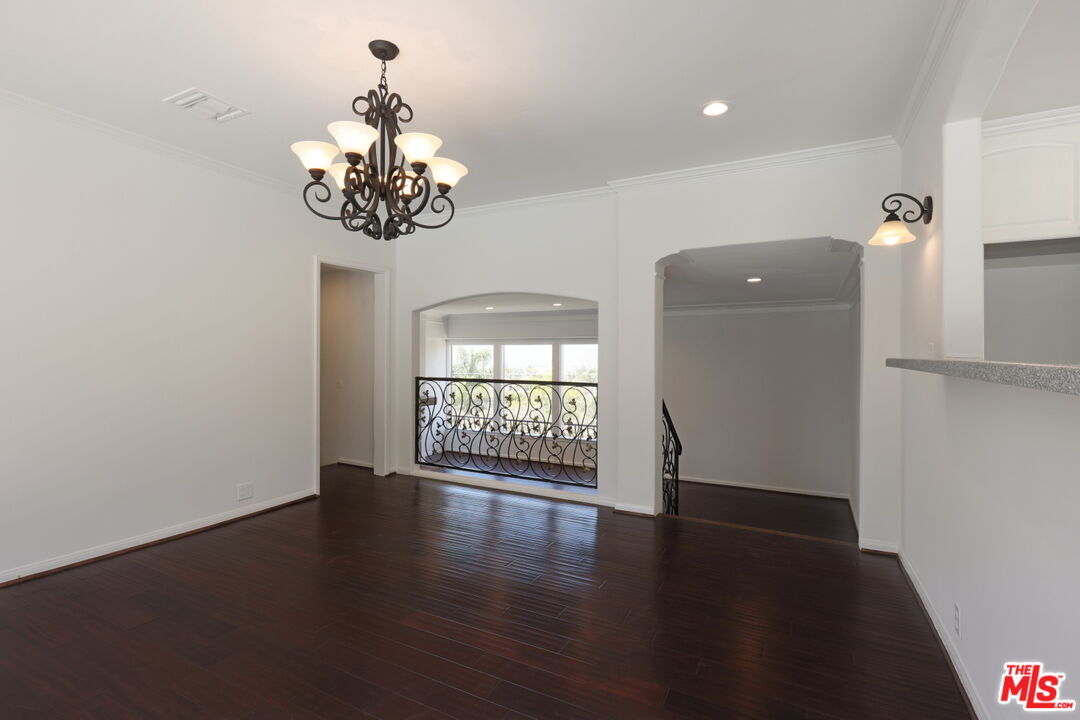 600 Luton Drive Glendale, CA 91206 - Photo 24 of 50 a view of an empty room with wooden floor and a window