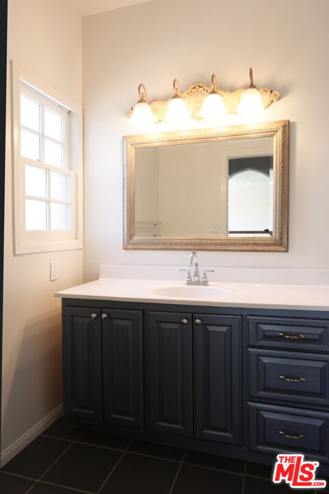 600 Luton Drive Glendale, CA 91206 - Photo 27 of 50 a bathroom with a sink and a mirror