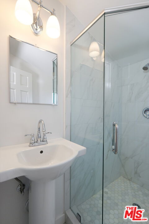 600 Luton Drive Glendale, CA 91206 - Photo 34 of 50 a bathroom with a sink and mirror
