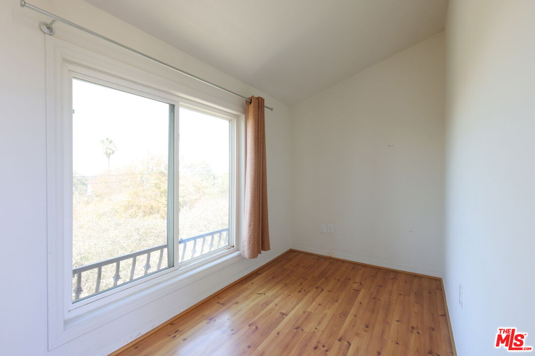 600 Luton Drive Glendale, CA 91206 - Photo 35 of 50 a view of empty room with wooden floor and fan