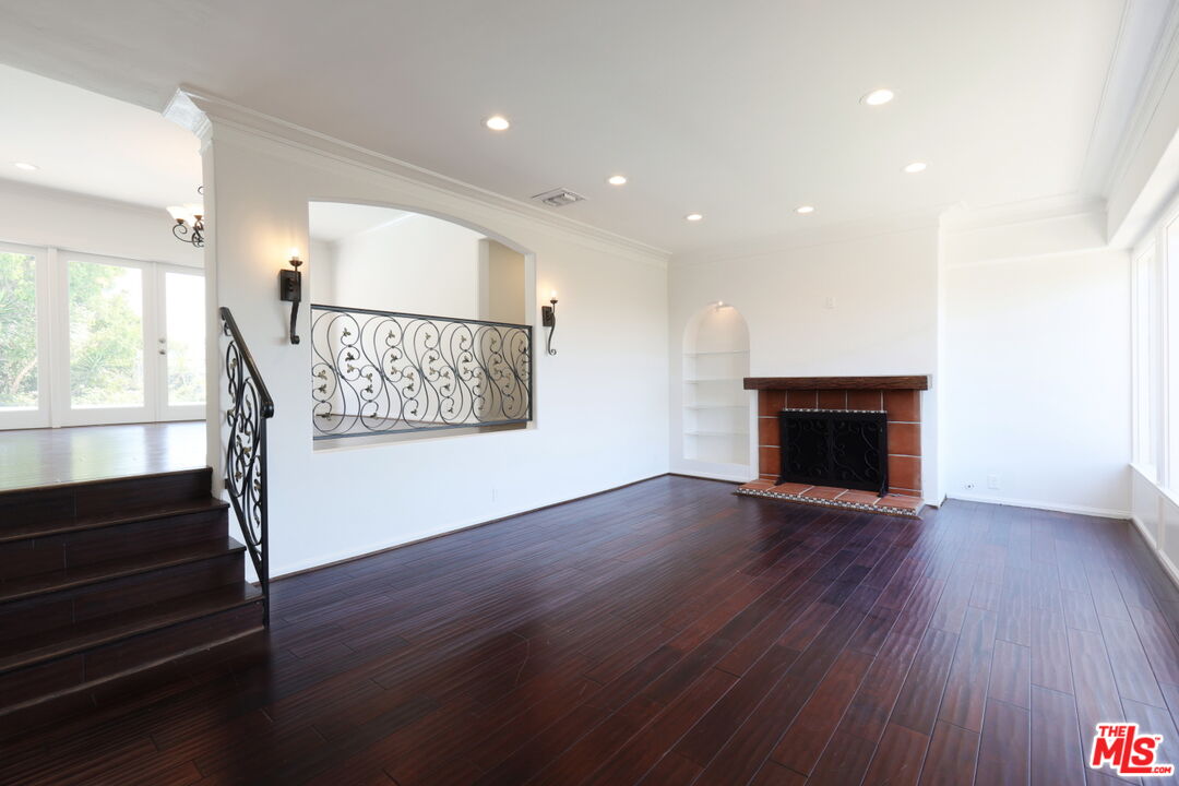 600 Luton Drive Glendale, CA 91206 - Photo 37 of 50 a view of an empty room with wooden floor and a window