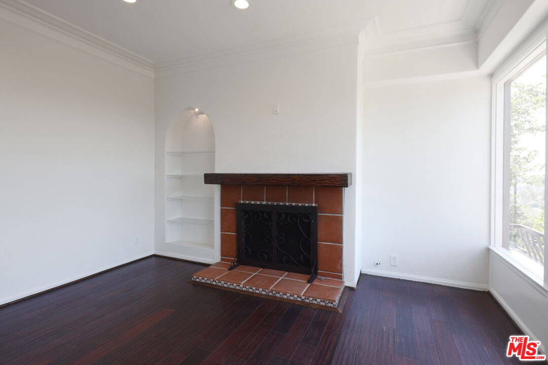 600 Luton Drive Glendale, CA 91206 - Photo 41 of 50 a room with fireplace and a fireplace