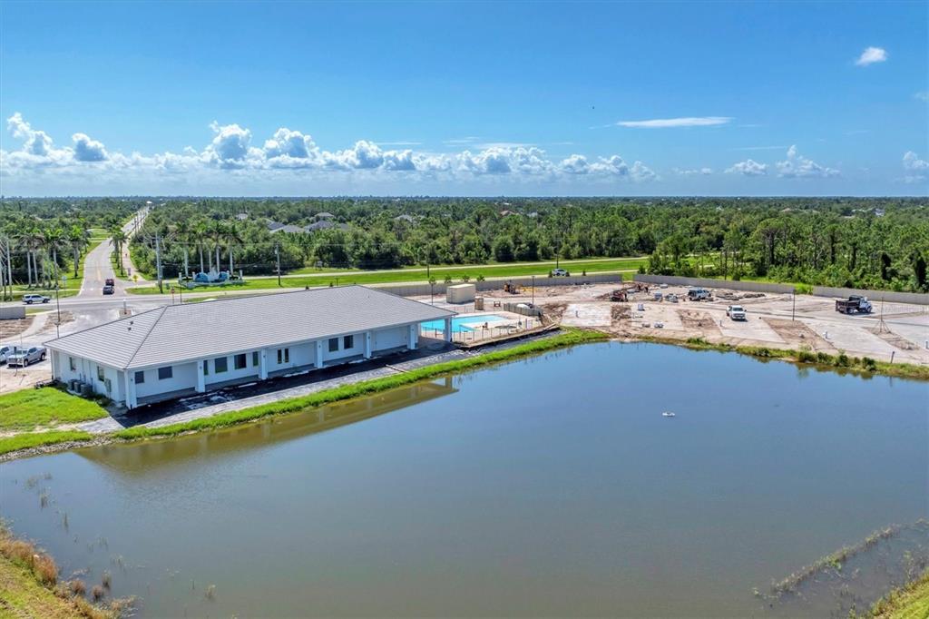 9001 Gasparilla Road, Unit 103 Placida, FL 33946 - Photo 55 of 75 a view of a swimming pool and lake view