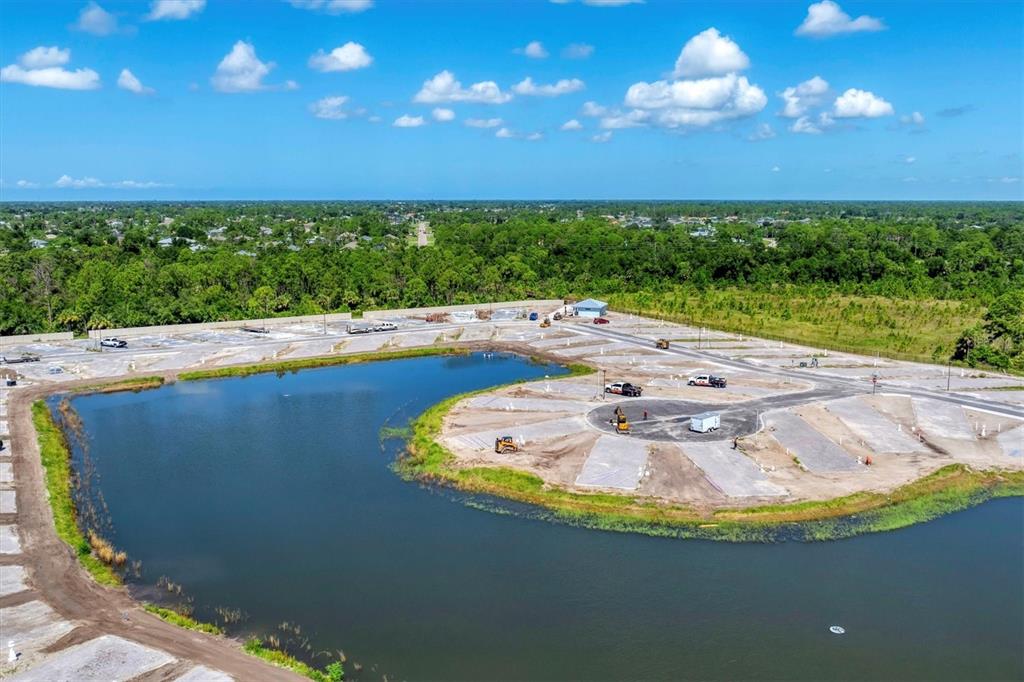 9001 Gasparilla Road, Unit 103 Placida, FL 33946 - Photo 62 of 75 a view of a swimming pool with an outdoor space and seating area