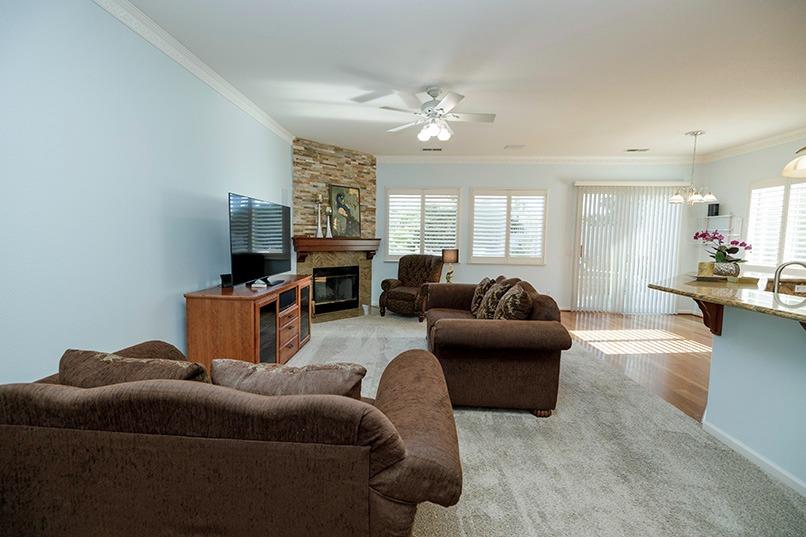 2001 Dayton Avenue Modesto, CA 95356 - Photo 29 of 94 a living room with furniture and a chandelier