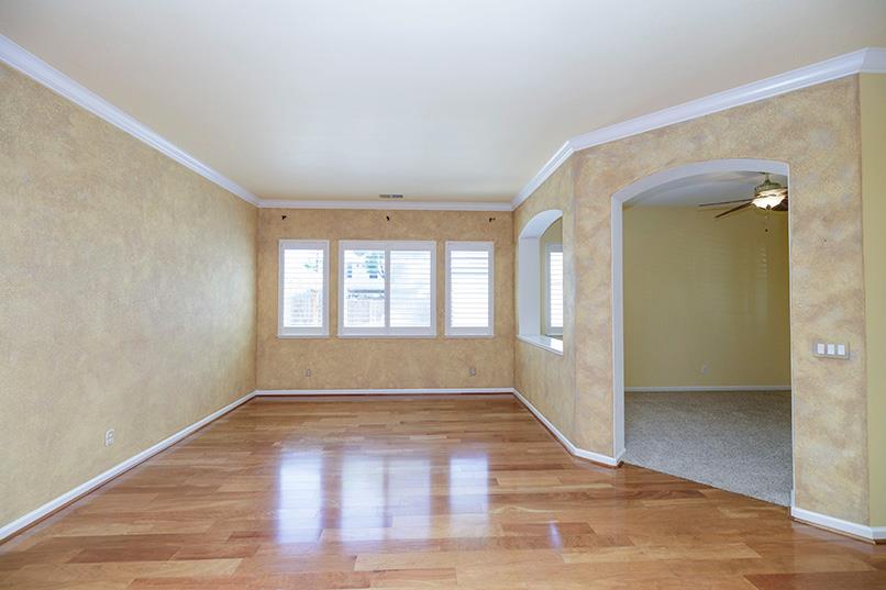 2001 Dayton Avenue Modesto, CA 95356 - Photo 40 of 94 a view of empty room with wooden floor and fan
