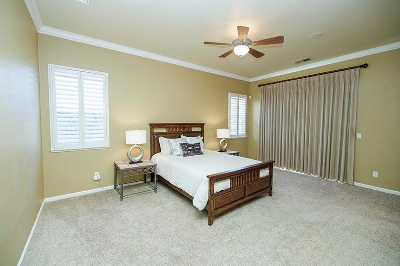 2001 Dayton Avenue Modesto, CA 95356 - Photo 57 of 94 a bed sitting in a spacious bedroom next to a window
