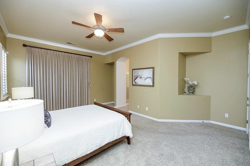2001 Dayton Avenue Modesto, CA 95356 - Photo 58 of 94 a bedroom with a bed and a ceiling fan
