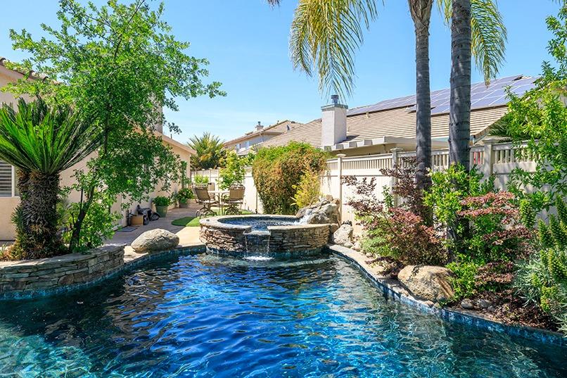 2001 Dayton Avenue Modesto, CA 95356 - Photo 83 of 94 a view of a swimming pool with a yard and plants