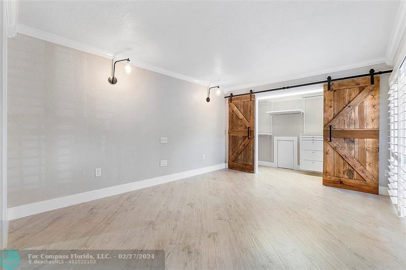 825 Center Street Jupiter, FL 33458 - Photo 14 of 37 wooden floor in an empty room