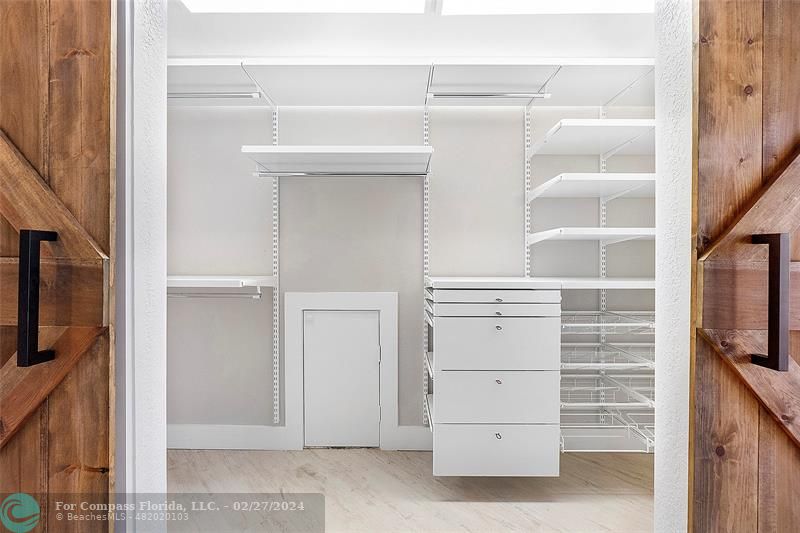 825 Center Street Jupiter, FL 33458 - Photo 16 of 37 a view of an empty walk in closet