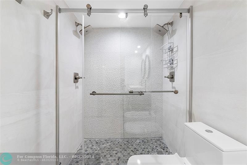 825 Center Street Jupiter, FL 33458 - Photo 18 of 37 a bathroom with a shower