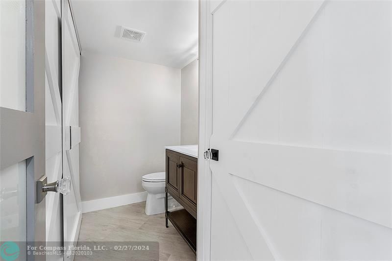 825 Center Street Jupiter, FL 33458 - Photo 25 of 37 a bathroom with a toilet and a shower