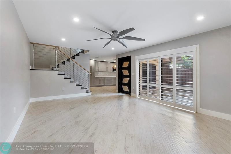 825 Center Street Jupiter, FL 33458 - Photo 5 of 37 a view of an empty room with a ceiling fan and window
