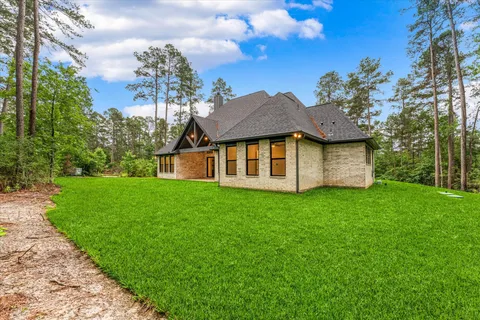 a view of a house with a garden