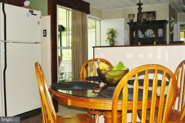 1820 Willann Road Rosedale, MD 21237 - Photo 17 of 27 a view of a dining room with furniture