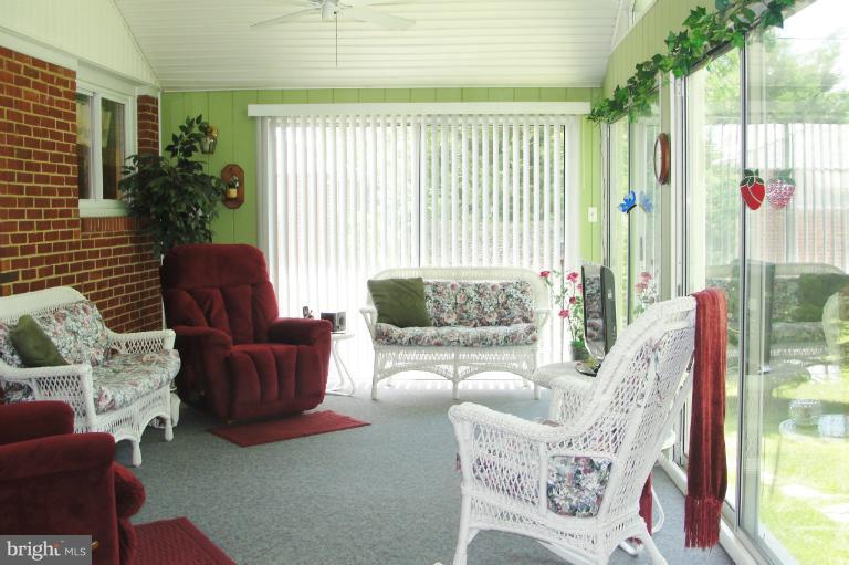 1820 Willann Road Rosedale, MD 21237 - Photo 23 of 27 a living room with furniture and a large window