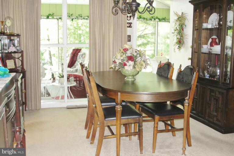 1820 Willann Road Rosedale, MD 21237 - Photo 8 of 27 a view of a dining room with furniture and a window