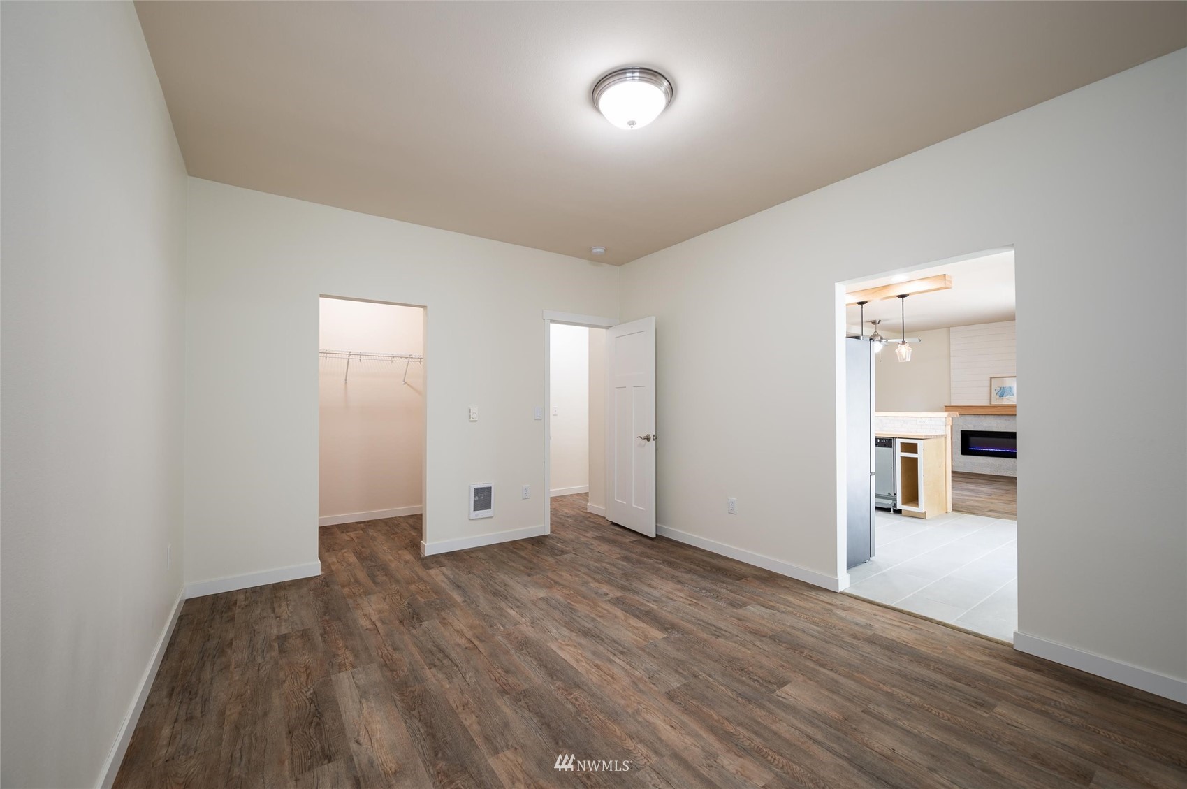 1305 Boon Street, Unit 122 Sumas, WA 98295 - Photo 15 of 21 wooden floor in an empty room with a window