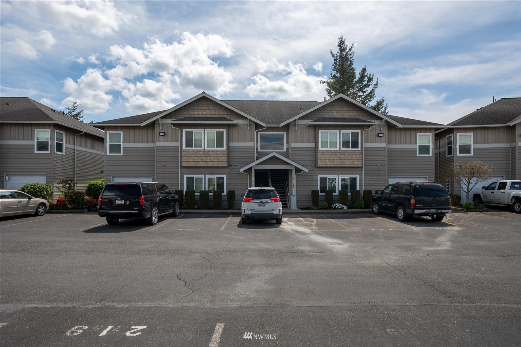 1305 Boon Street, Unit 122 Sumas, WA 98295 - Photo 2 of 21 a car parked in front of a house