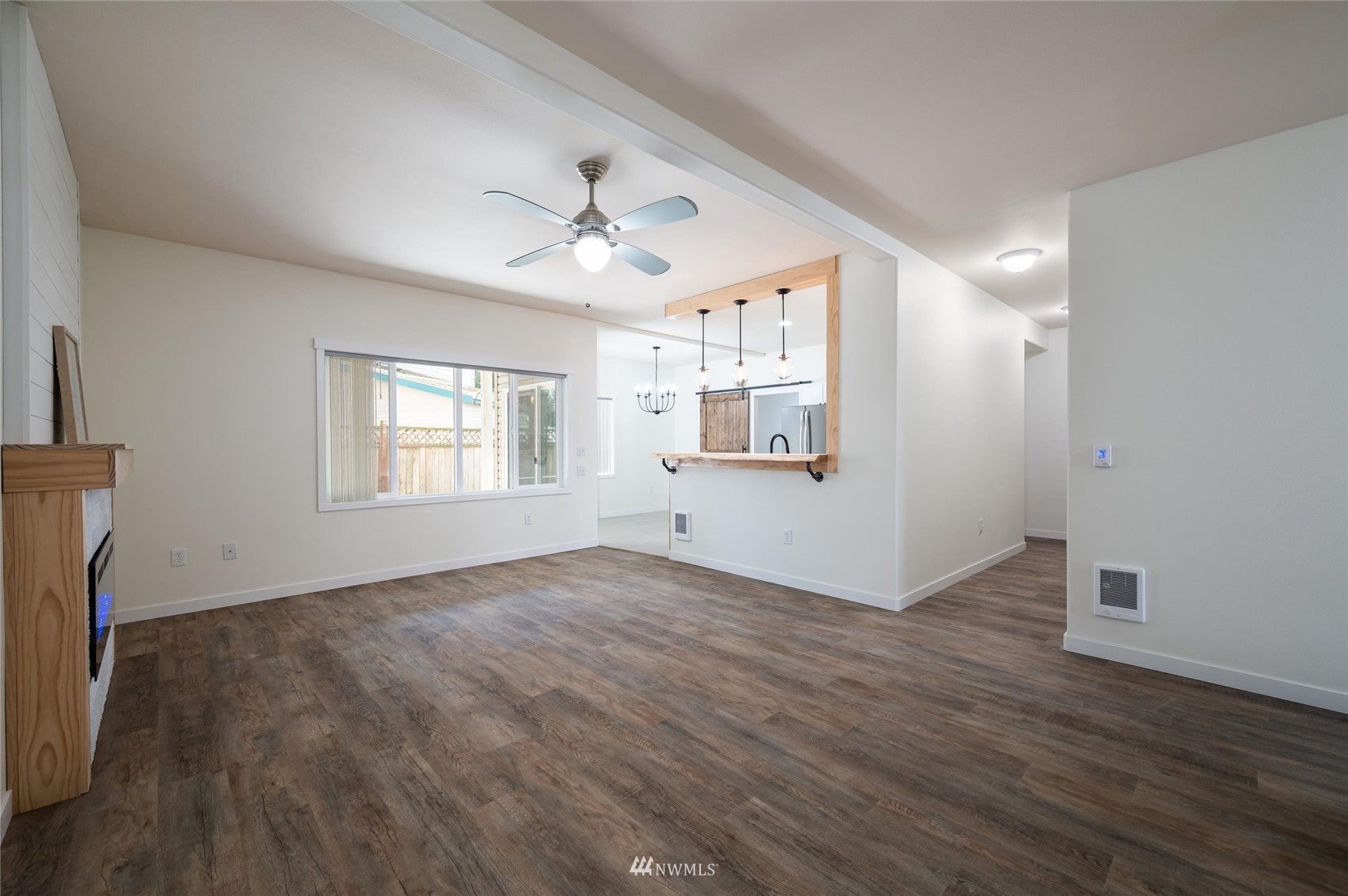 1305 Boon Street, Unit 122 Sumas, WA 98295 - Photo 3 of 21 wooden floor in an empty room with a window