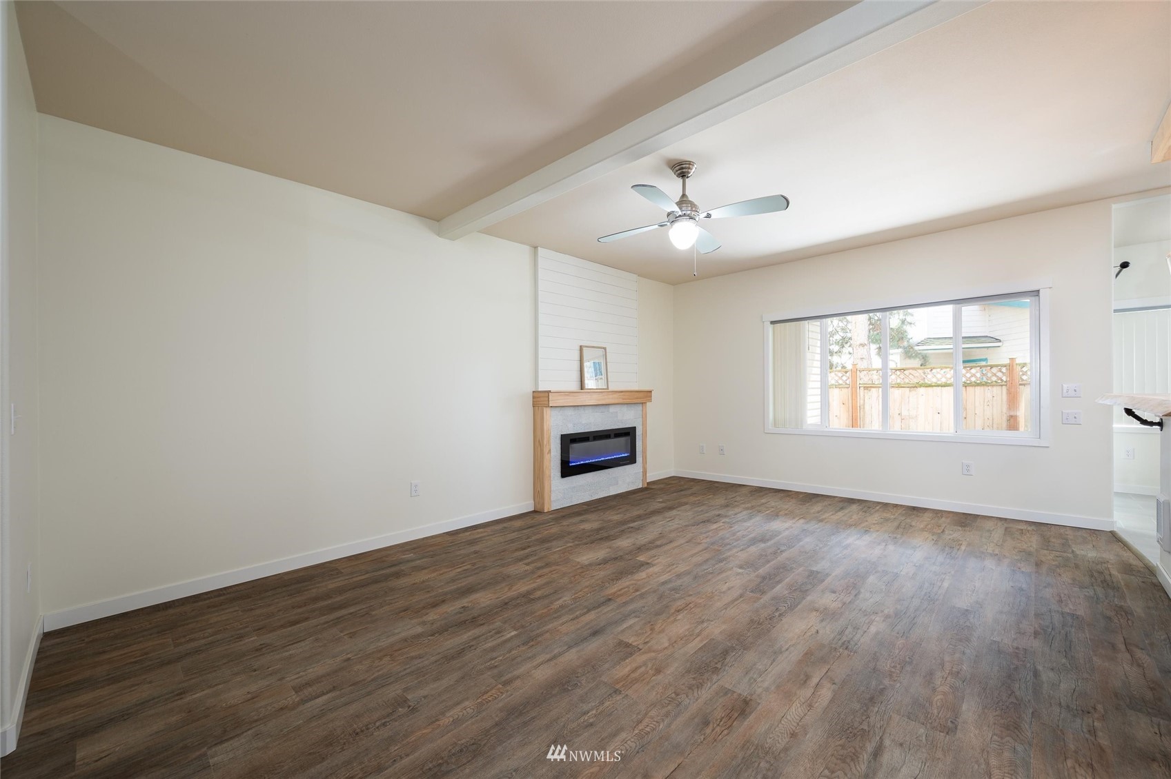 1305 Boon Street, Unit 122 Sumas, WA 98295 - Photo 4 of 21 wooden floor in an empty room with a window