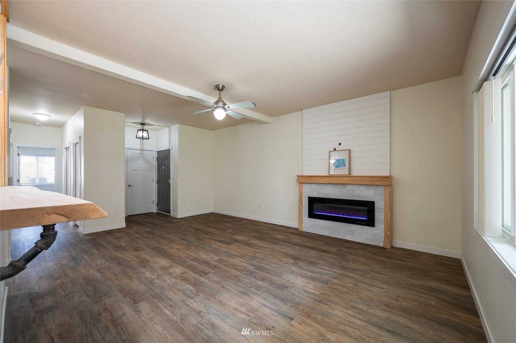 1305 Boon Street, Unit 122 Sumas, WA 98295 - Photo 5 of 21 wooden floor fireplace and windows in an empty room