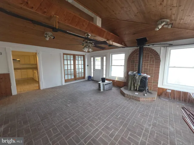 a lobby with furniture and a window