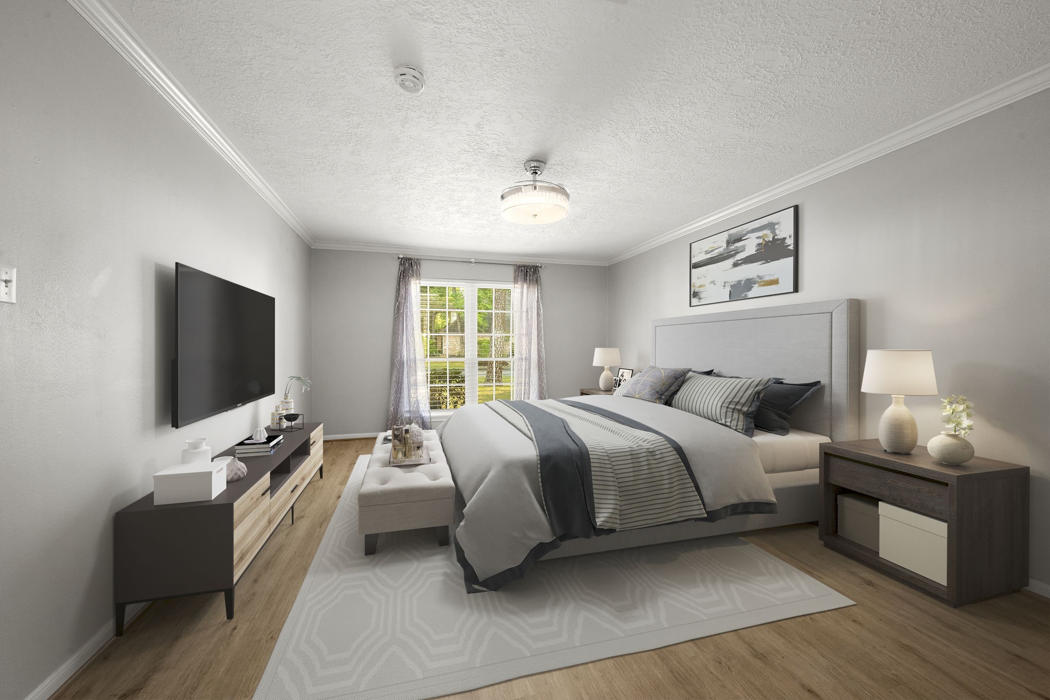 6607 Saffron Hills Drive Spring, TX 77379 - Photo 22 of 48 a bedroom with a bed and a flat screen tv