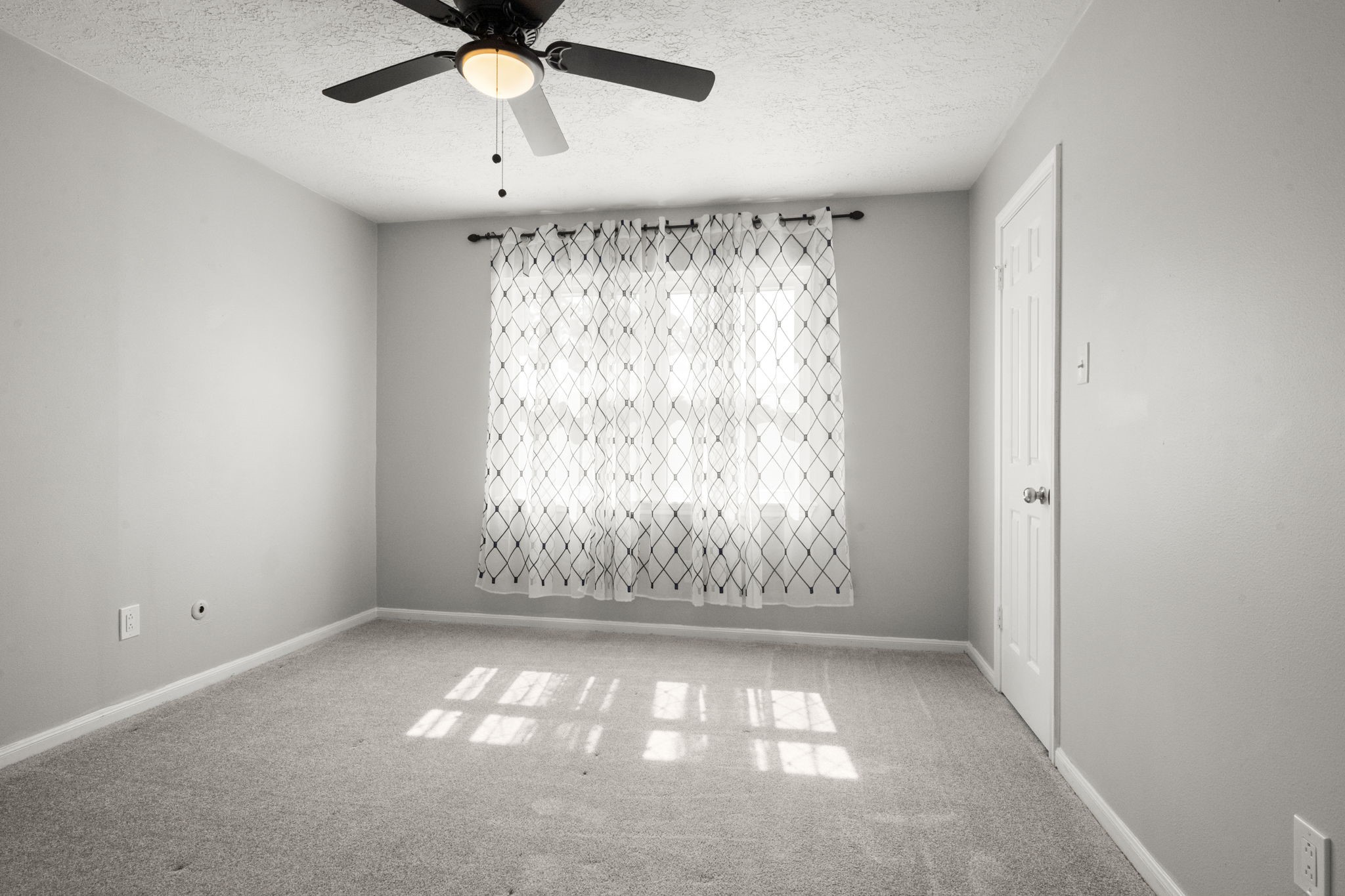 6607 Saffron Hills Drive Spring, TX 77379 - Photo 26 of 48 a view of an empty room with a window