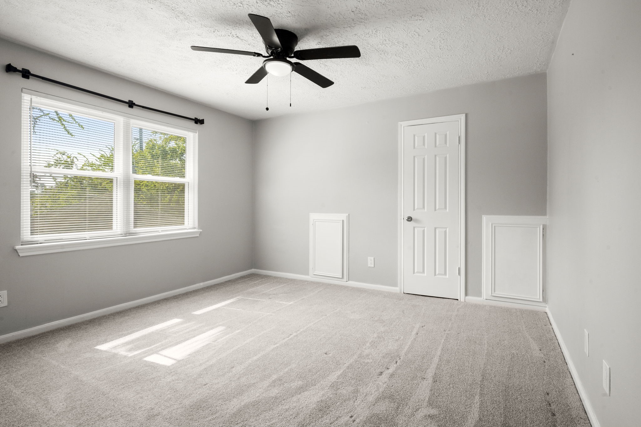 6607 Saffron Hills Drive Spring, TX 77379 - Photo 30 of 48 wooden floor in an empty room with a window