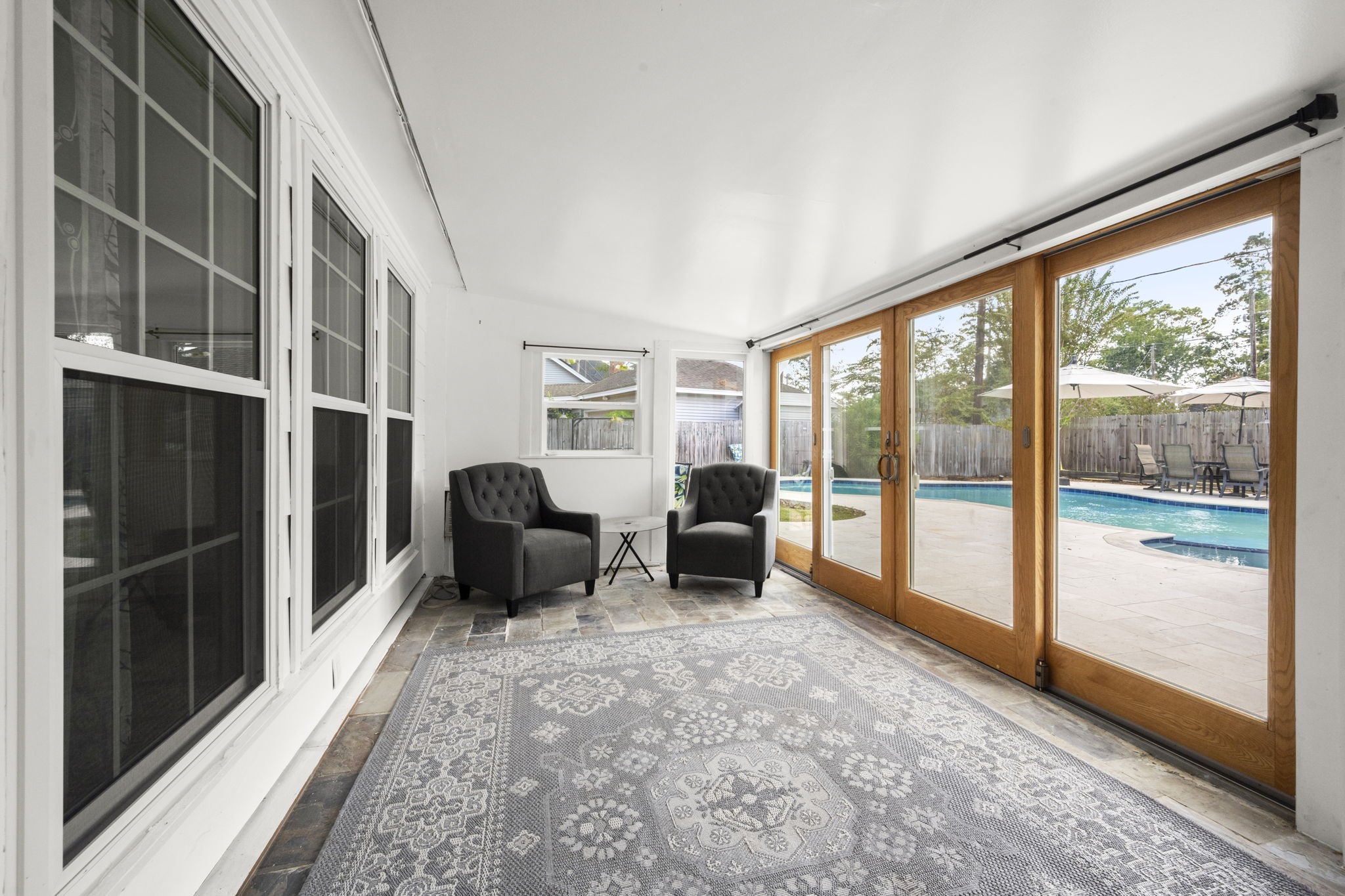 6607 Saffron Hills Drive Spring, TX 77379 - Photo 32 of 48 Lovely sunroom off the family room is great for indoor/outdoor entertaining.