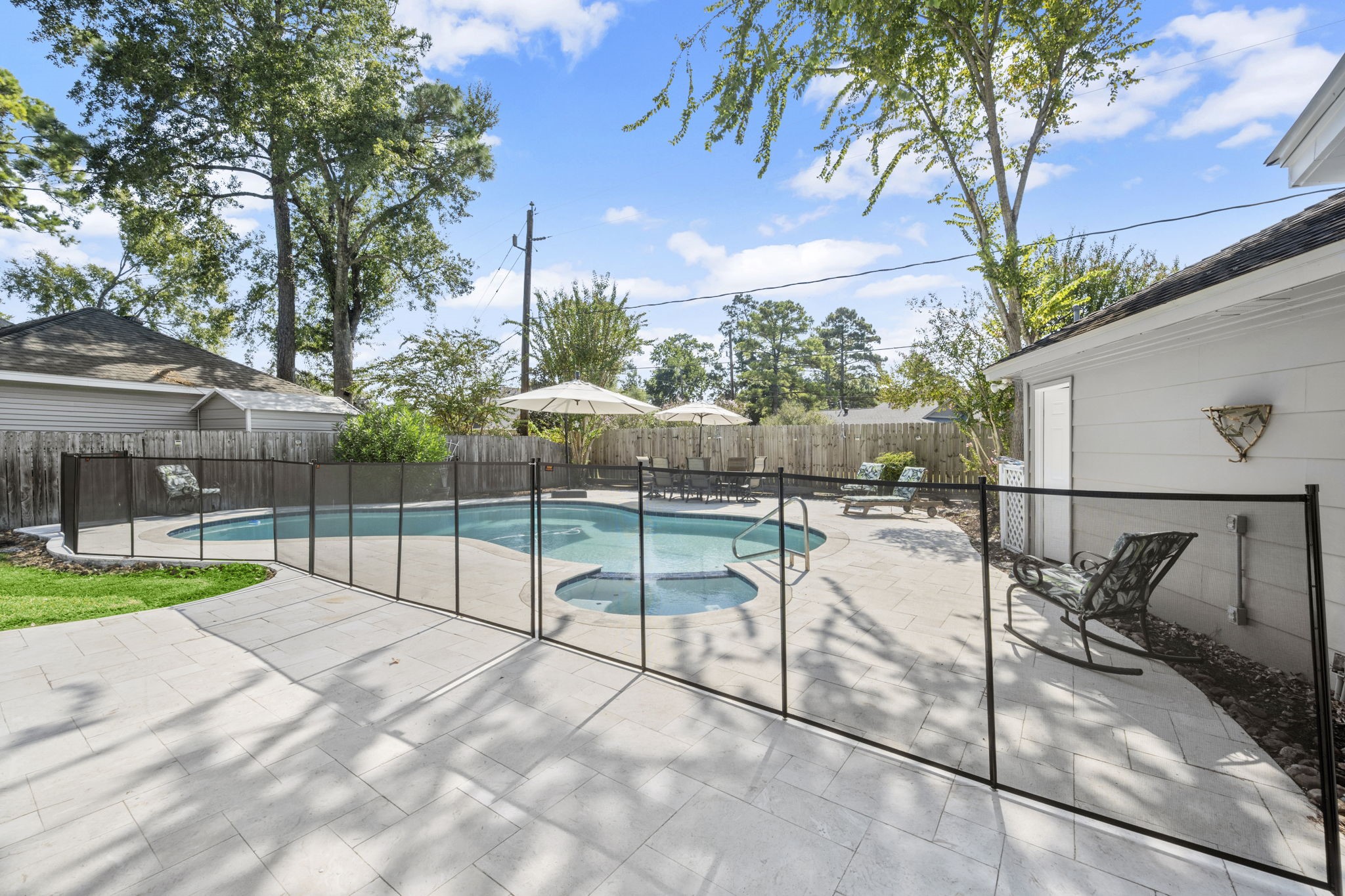 6607 Saffron Hills Drive Spring, TX 77379 - Photo 35 of 48 a view of a backyard