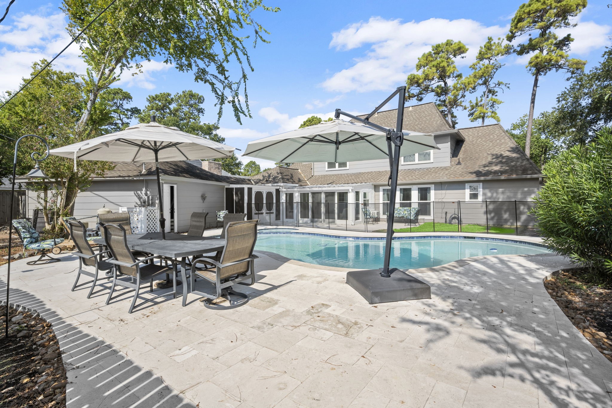 6607 Saffron Hills Drive Spring, TX 77379 - Photo 37 of 48 Tons of decking allows for multiple seating areas.