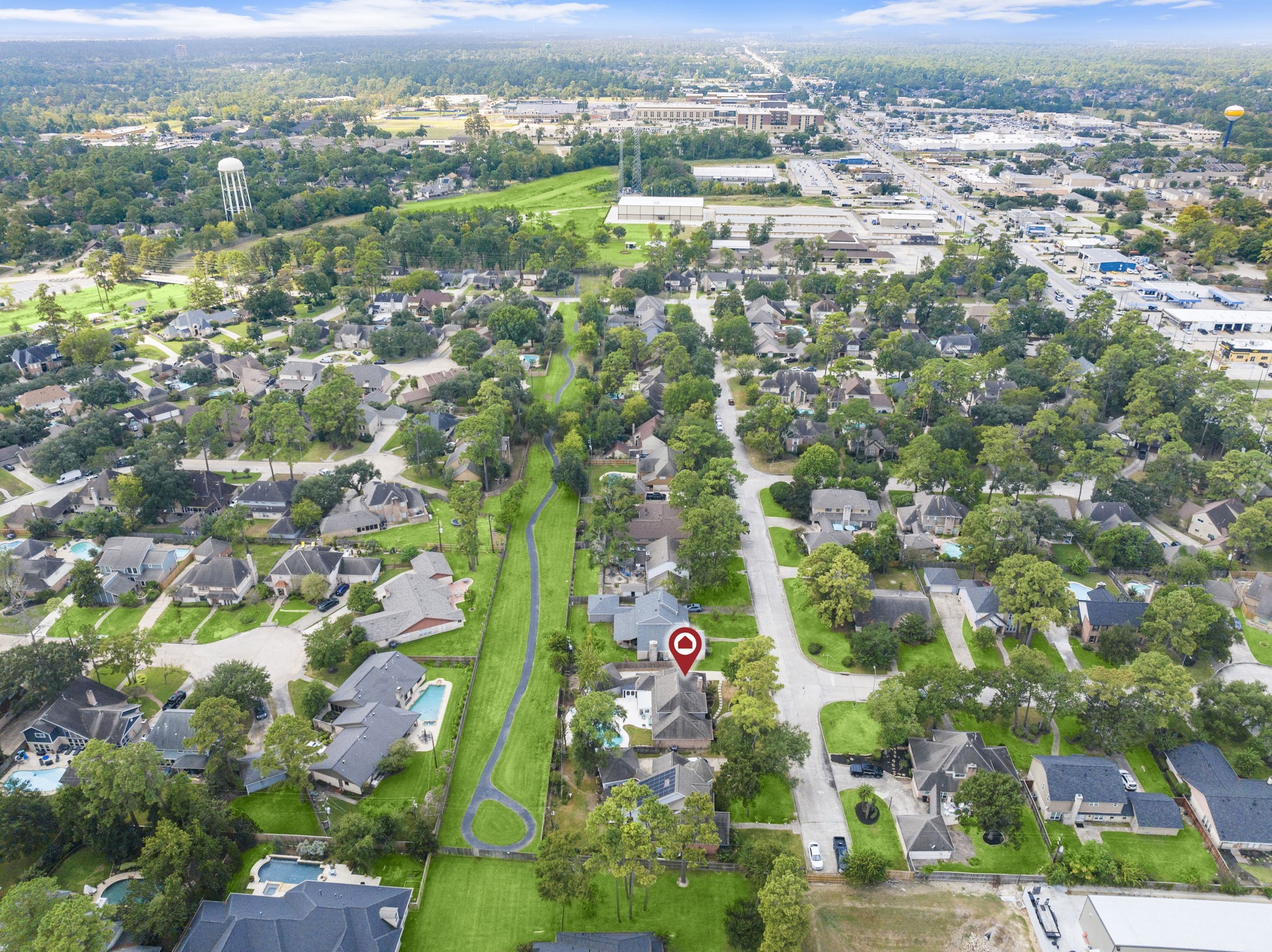6607 Saffron Hills Drive Spring, TX 77379 - Photo 45 of 48 an aerial view of residential houses with outdoor space
