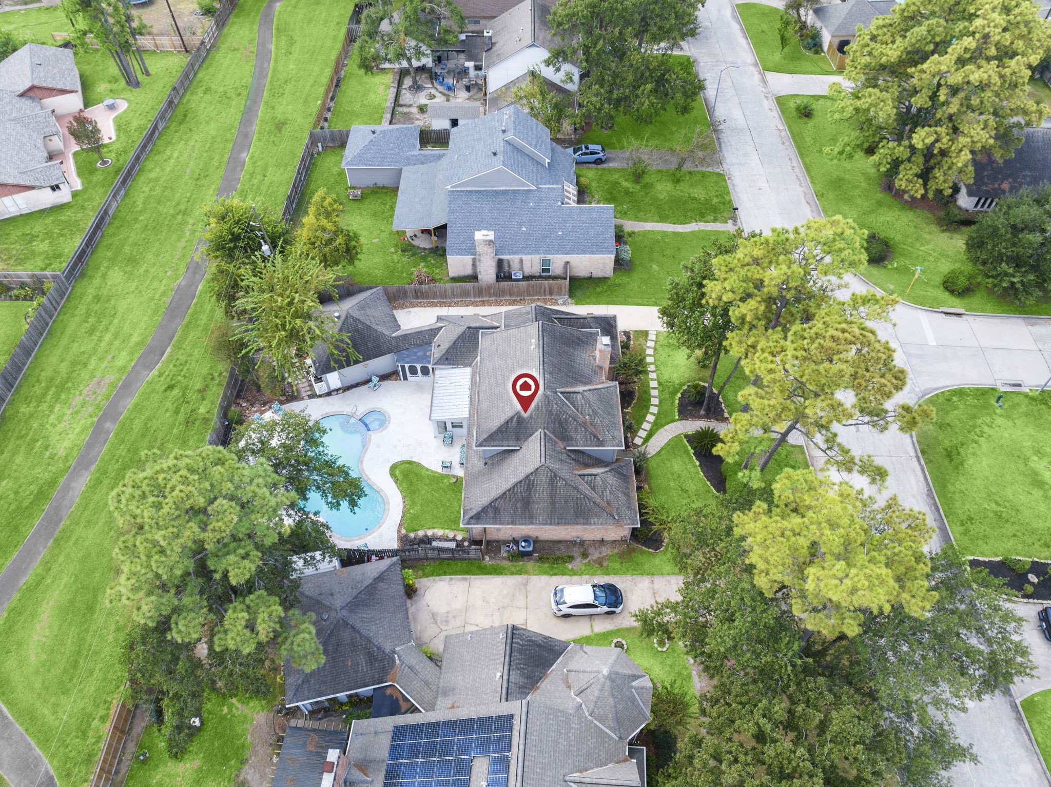 6607 Saffron Hills Drive Spring, TX 77379 - Photo 47 of 48 an aerial view of house with yard and swimming pool