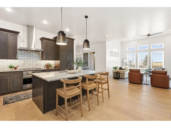 a kitchen with kitchen island granite countertop lots of counter top space