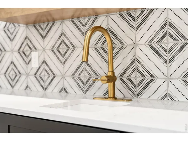 a view of a kitchen with a sink