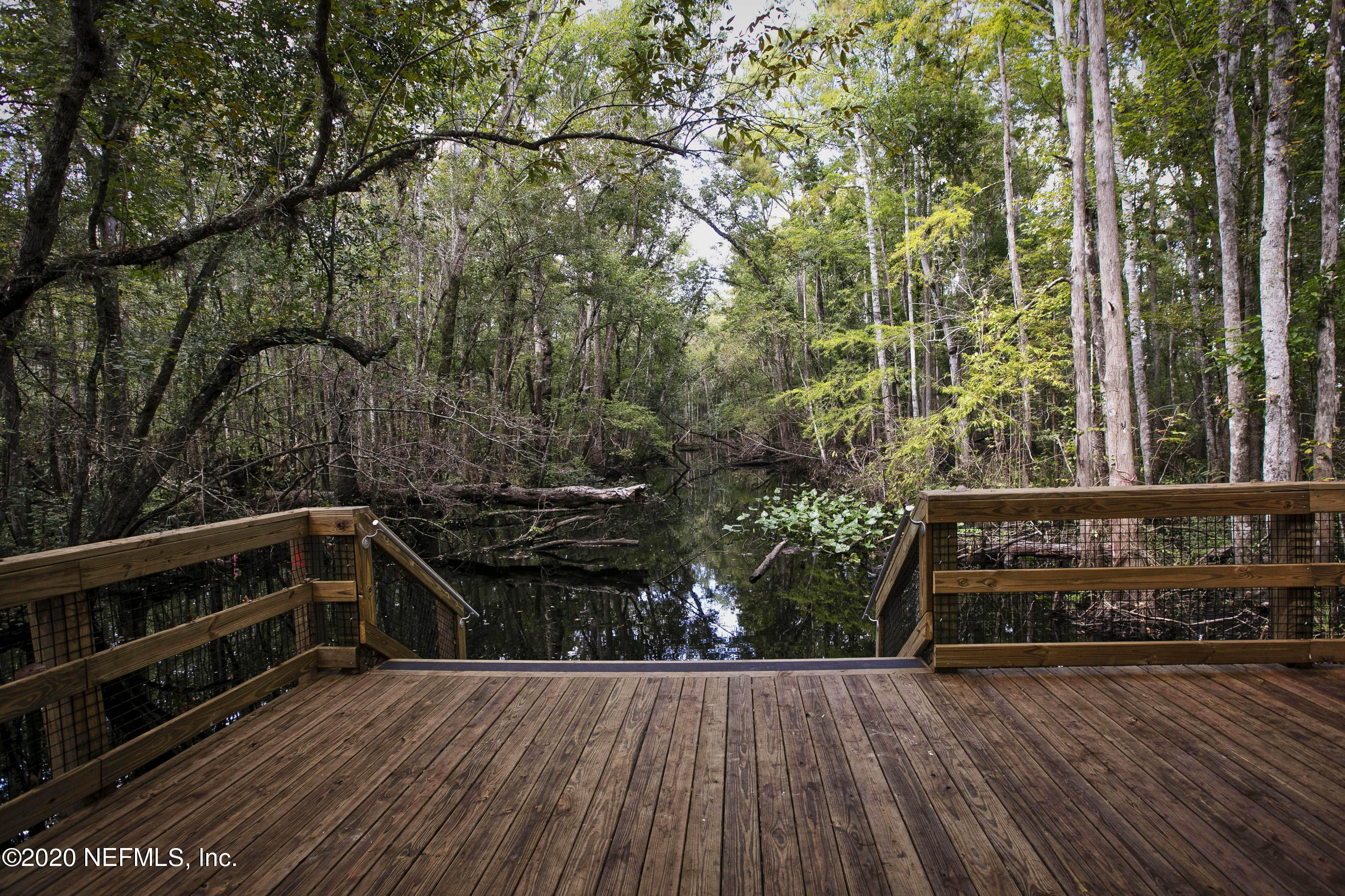 933 Rustic Mill Dr Street St. Augustine, FL 32092 - Photo 22 of 29 a view of stairs and yard with green space