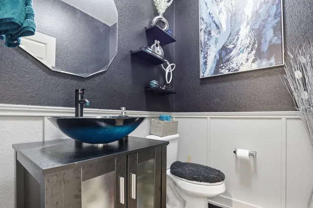 a view of a hallway with seating space