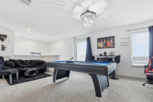 a view of a workspace with furniture