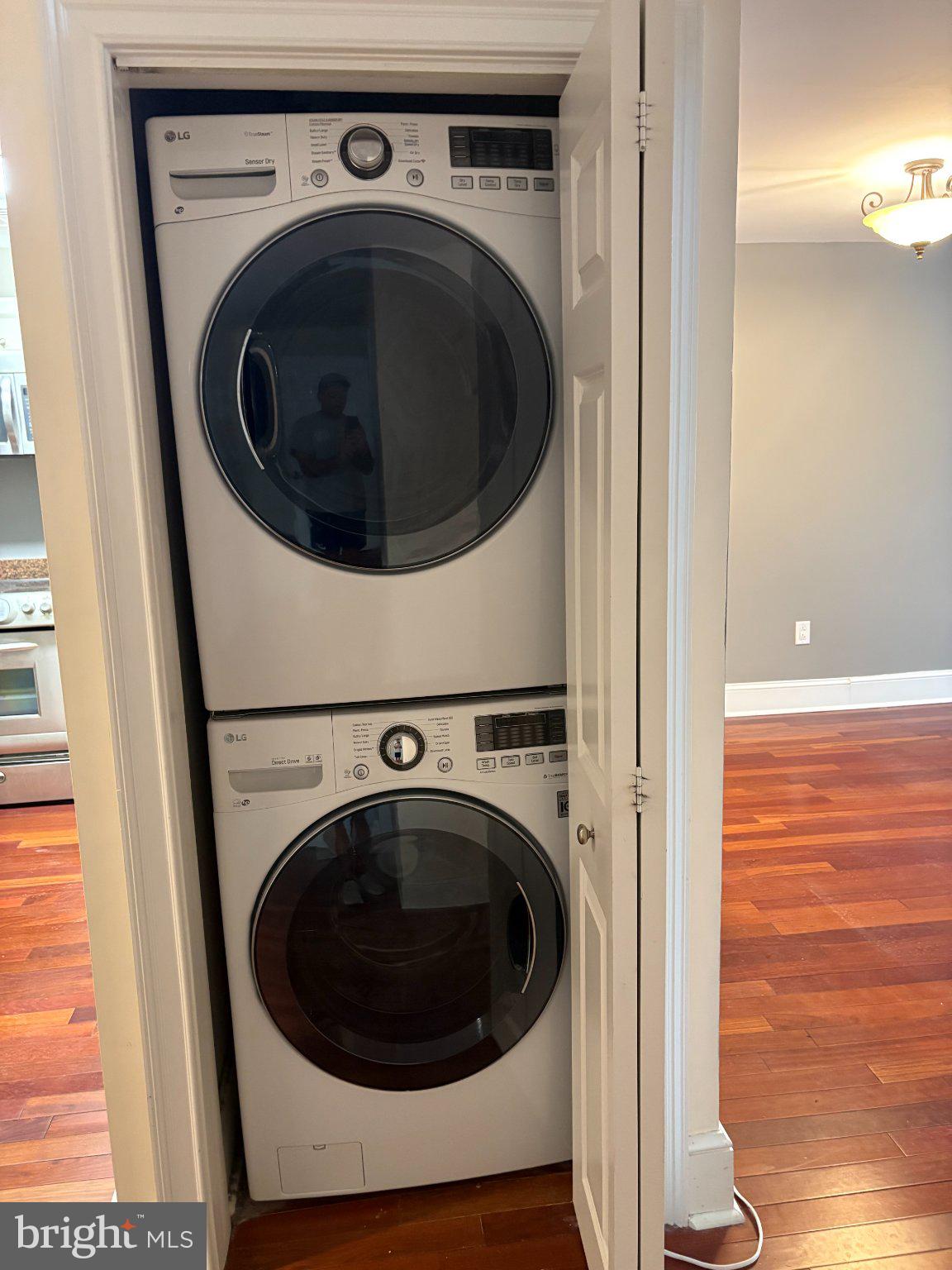 1500 Chestnut Street, Unit 4D Philadelphia, PA 19102 - Photo 18 of 26 Efficient laundry nook in modern design.