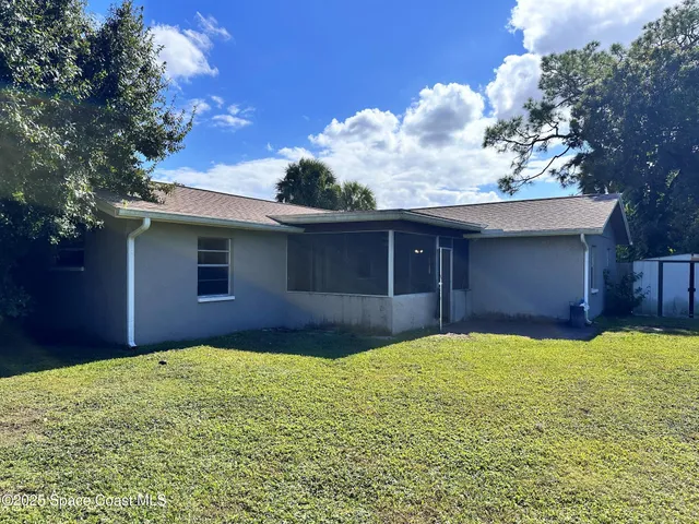 a house view with a garden space