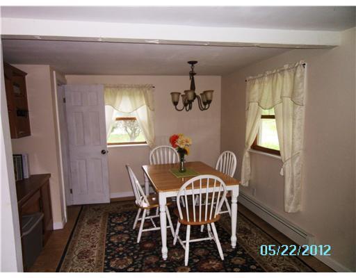 1078 River Road Tenants Harbor, ME 04860 - Photo 9 of 13 Dining Room. Built-in desk, sairway...