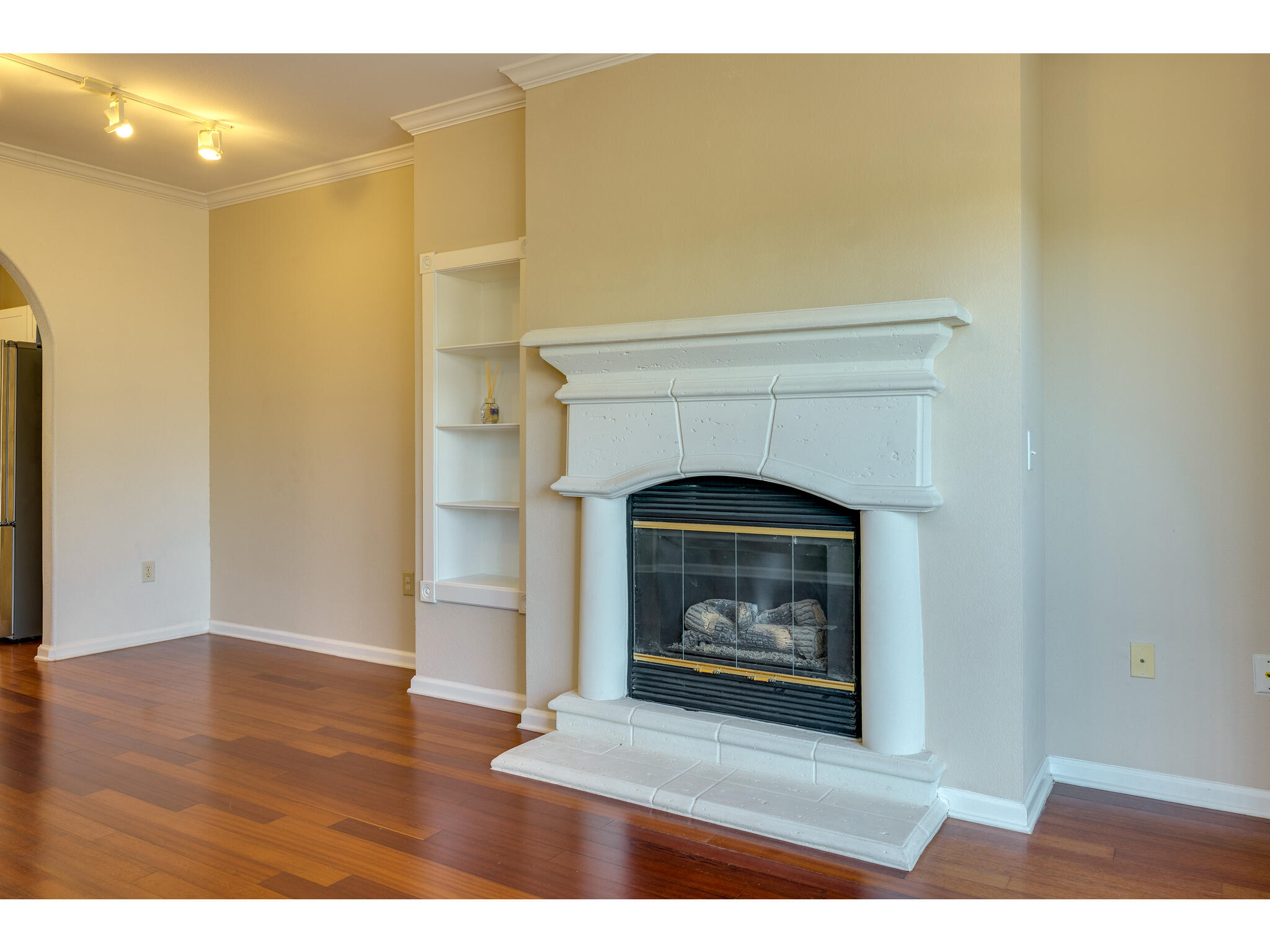 11203 Ranch Road 2222, Unit 106 Austin, TX 78732 - Photo 19 of 40 Cast stone fireplace - closer look