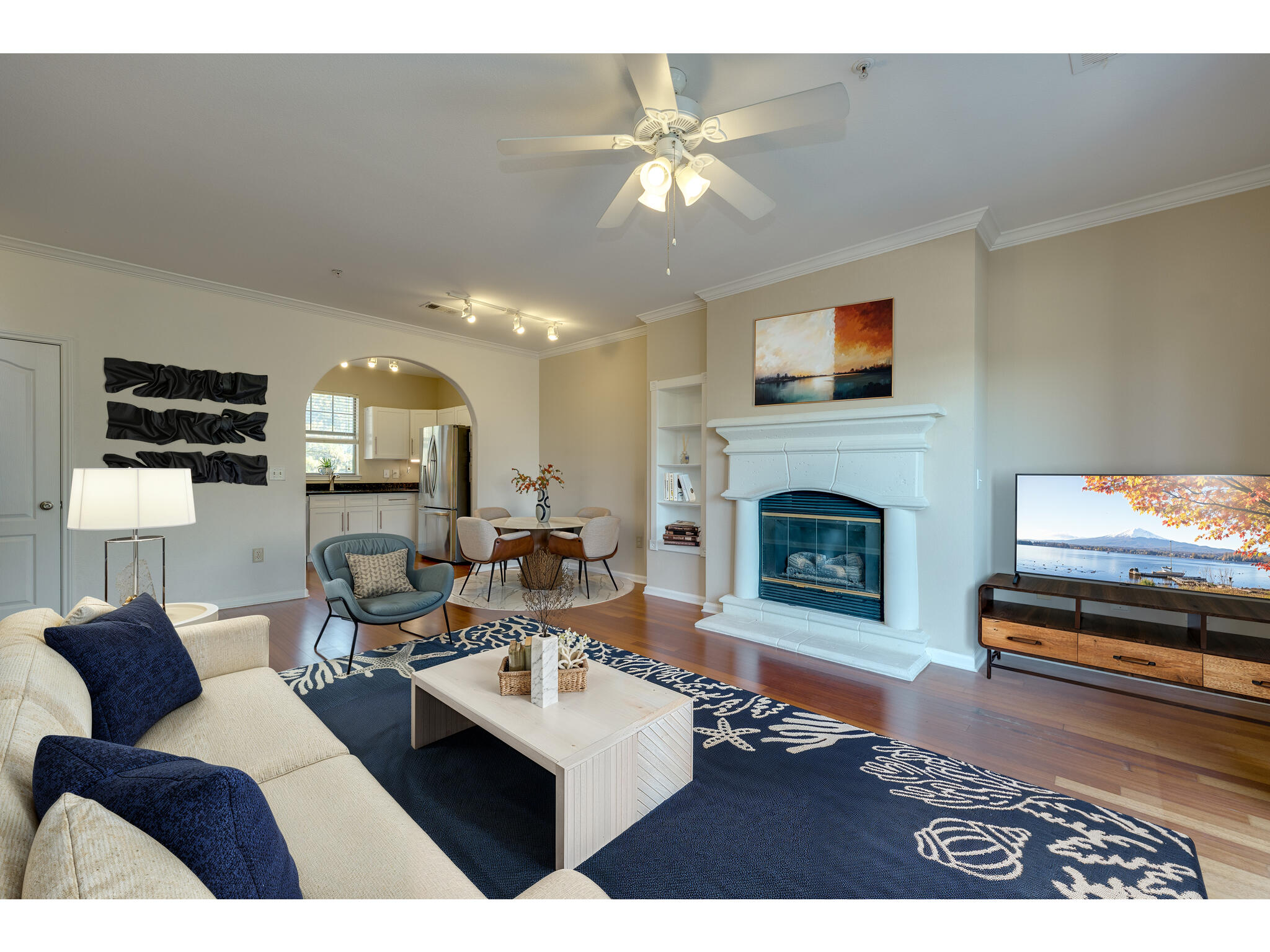 11203 Ranch Road 2222, Unit 106 Austin, TX 78732 - Photo 2 of 40 Living room with fire place and balcony