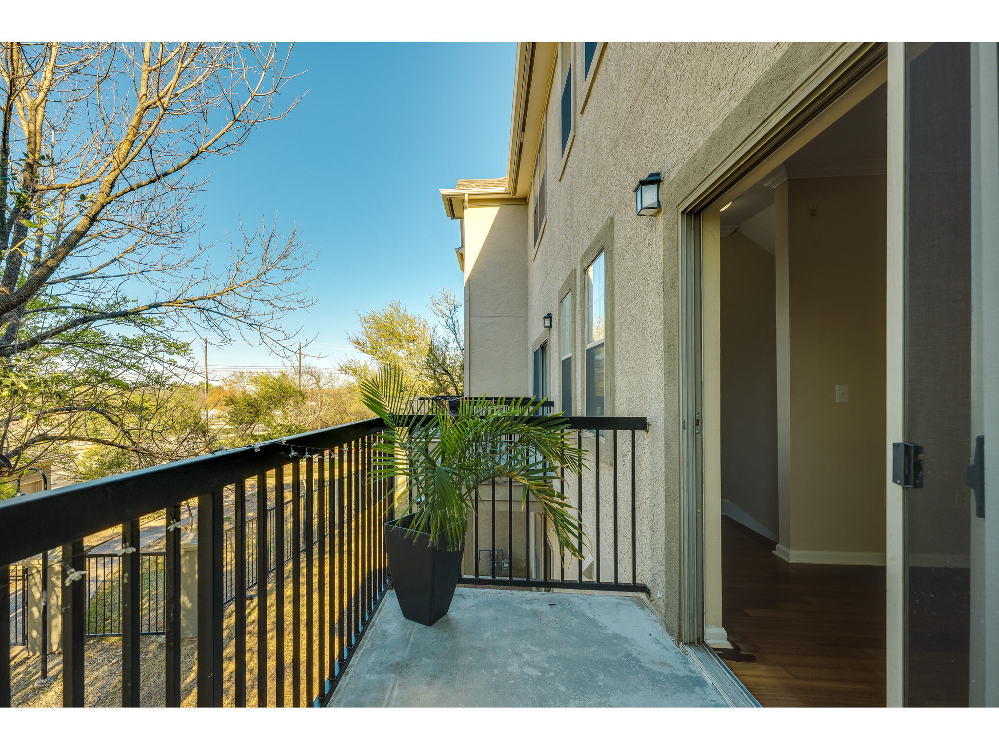 11203 Ranch Road 2222, Unit 106 Austin, TX 78732 - Photo 25 of 40 View of balcony to the south