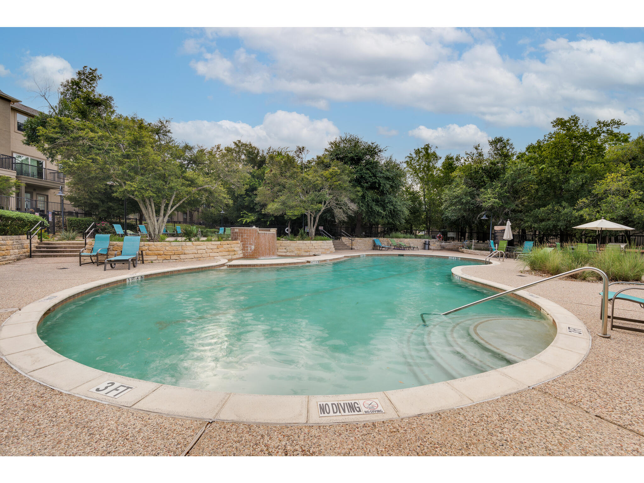 11203 Ranch Road 2222, Unit 106 Austin, TX 78732 - Photo 37 of 40 Community pool with a patio