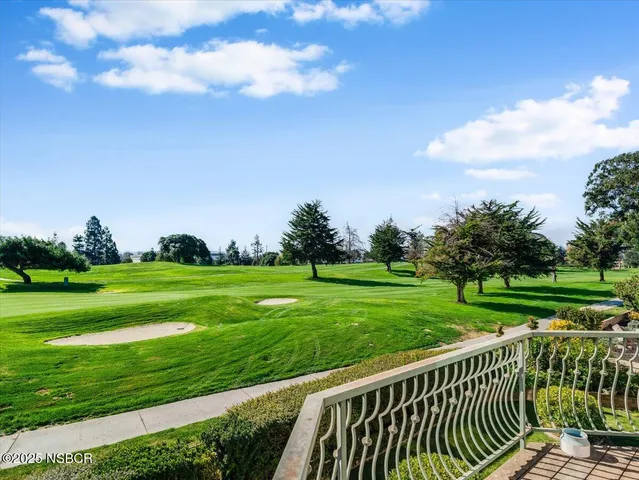 a view of a garden and deck