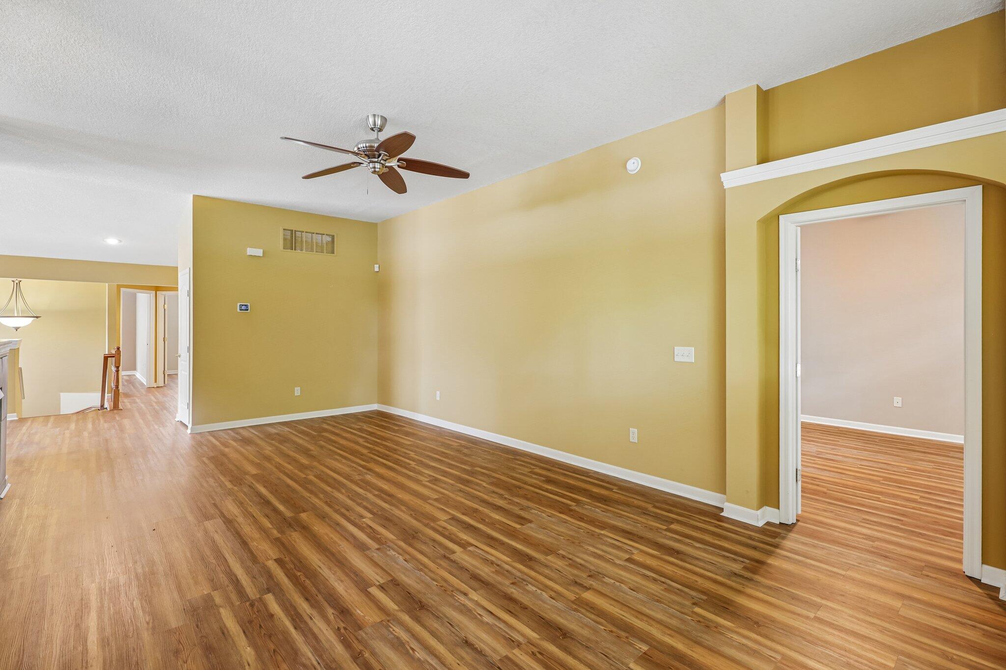 876 Flint Ridge Newport, KY 41076 - Photo 17 of 43 Spacious interior room featuring wood-finish flooring, a ceiling fan, and a neutral wall color